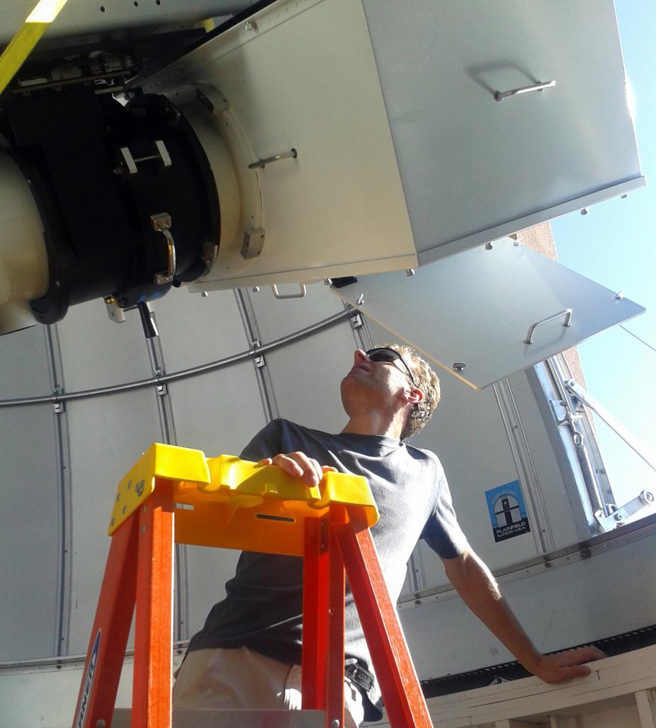 K-cor instrument scientist Alfred de Wijn inspects the calibration optics at the Mesa spar in Boulder