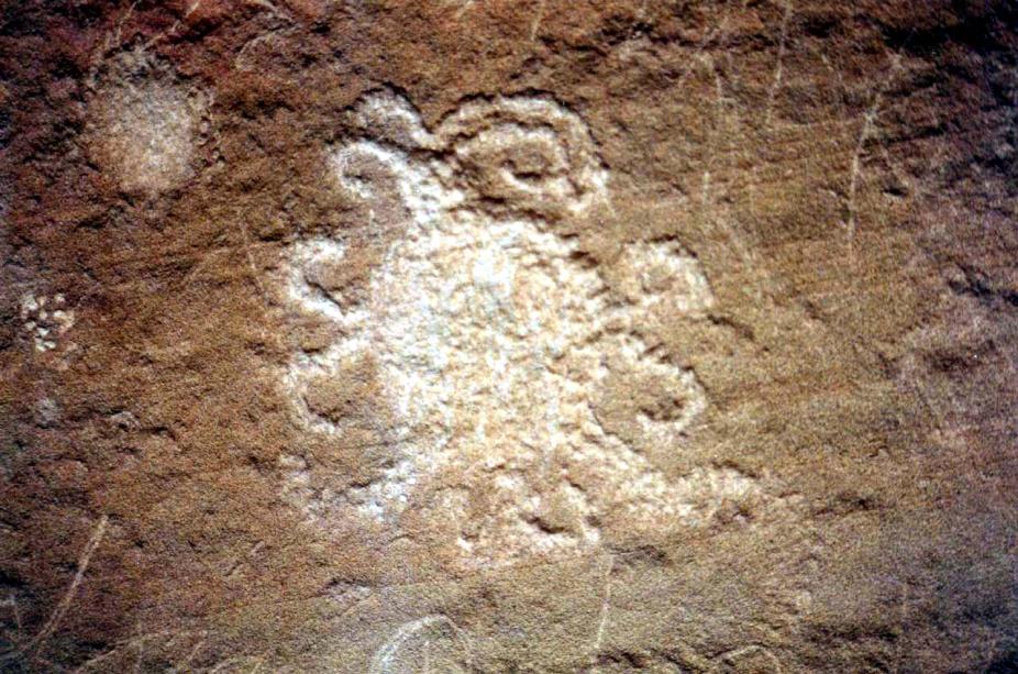 A petroglyph, suggestive of a solar eclipse, is found on the South side of a large boulder near the Una Vida ruin in Chaco Canyon