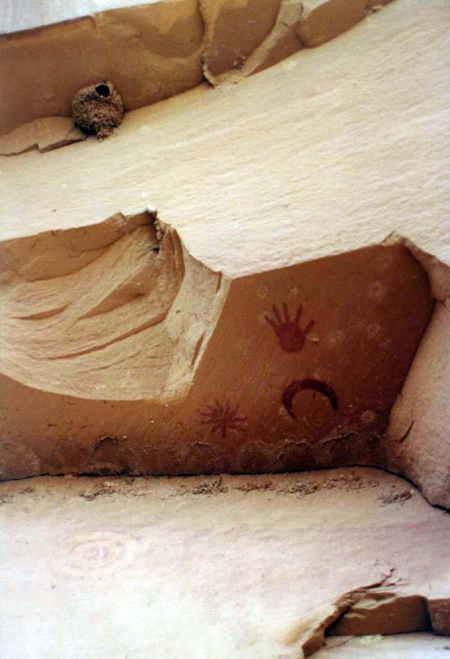 Supernova pictograph panel contains three symbols: a large star (supernova), a crescent moon, and a hand print