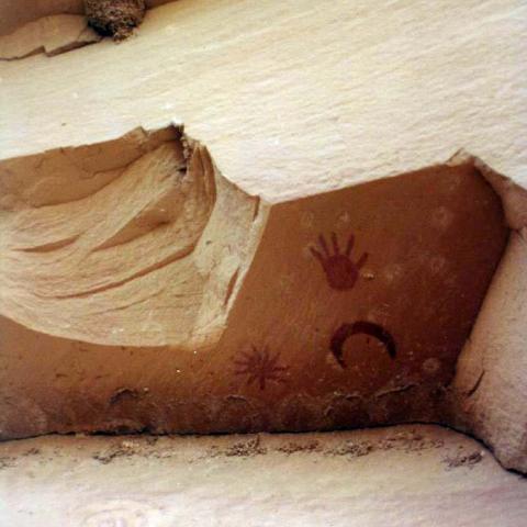 Supernova pictograph panel contains three symbols: a large star (supernova), a crescent moon, and a hand print